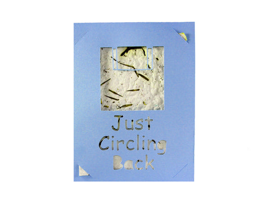 Card with an old computer disk with the text "Just Circling Back"
